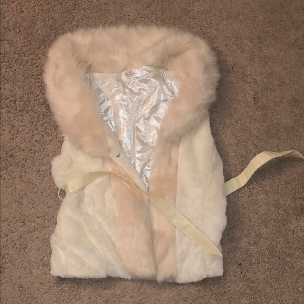 Super cute and furry vest